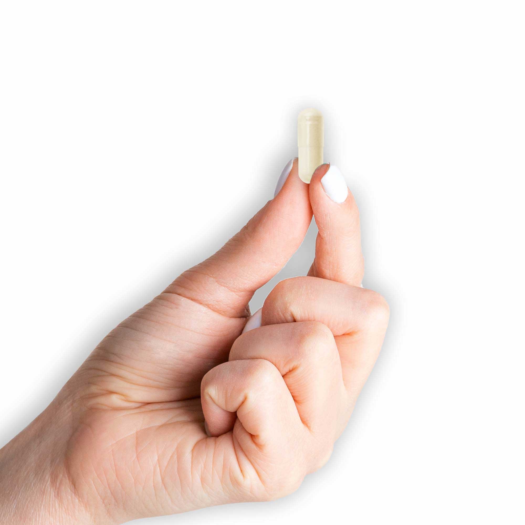 Mason Natural Highly Absorbable Magnesium Glycinate 360 mg - 180 Veggie Capsules. Image of a hand holding the supplement capsule.